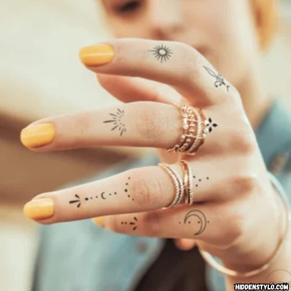 meaningful symbol finger tattoos 