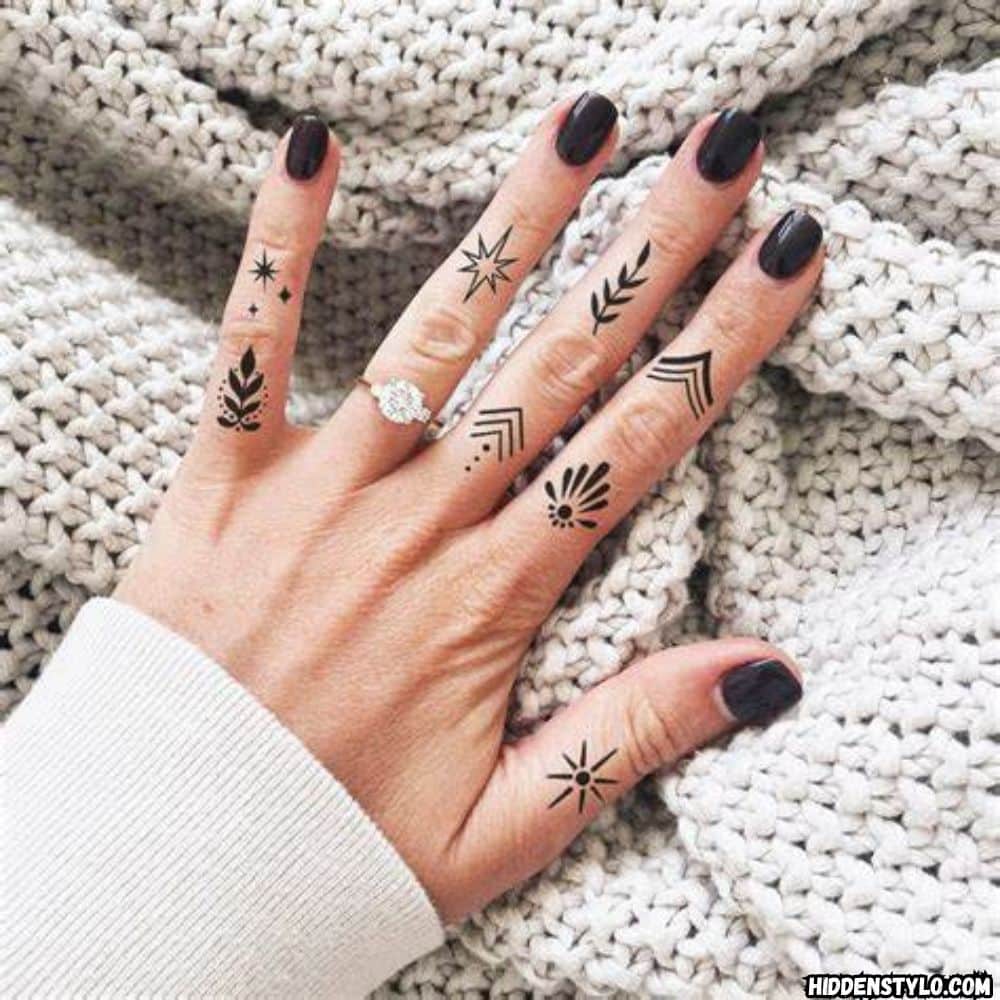 meaningful symbol finger tattoos